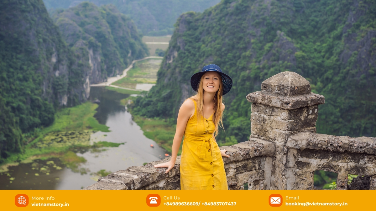 The stunning panoramic view from the Mua Cave summit, overlooking the Ngo Dong River snaking through Ninh Binh's rice fields and limestone karsts. The stunning panoramic view from the Mua Cave summit, overlooking the Ngo Dong River snaking through Ninh Binh's rice fields and limestone karsts.